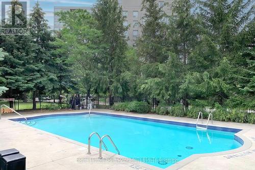 404 - 91 Townsgate Drive, Vaughan, ON - Outdoor With In Ground Pool With Backyard