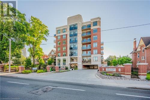 399 Queen St S Street Unit# 102, Kitchener, ON - Outdoor With Facade