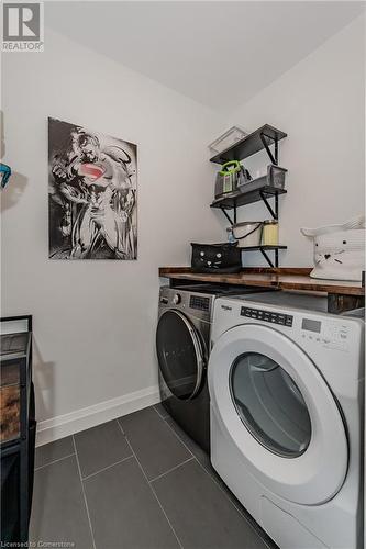 399 Queen St S Street Unit# 102, Kitchener, ON - Indoor Photo Showing Laundry Room