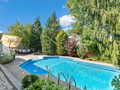 Pool - 4327 Rue Juneau, Montréal (Pierrefonds-Roxboro), QC - Outdoor With In Ground Pool With Backyard