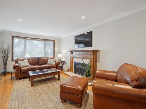 Salon - 4327 Rue Juneau, Montréal (Pierrefonds-Roxboro), QC - Indoor Photo Showing Living Room With Fireplace