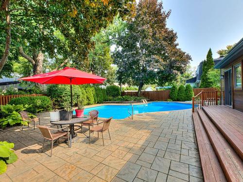 Backyard - 107 Av. De Charente, Saint-Lambert, QC - Outdoor With In Ground Pool With Backyard