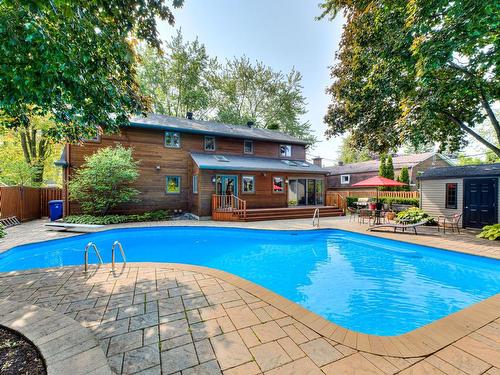 Pool - 107 Av. De Charente, Saint-Lambert, QC - Outdoor With In Ground Pool With Deck Patio Veranda With Backyard With Exterior