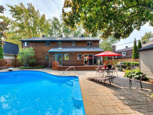 Pool - 107 Av. De Charente, Saint-Lambert, QC - Outdoor With In Ground Pool With Deck Patio Veranda With Exterior