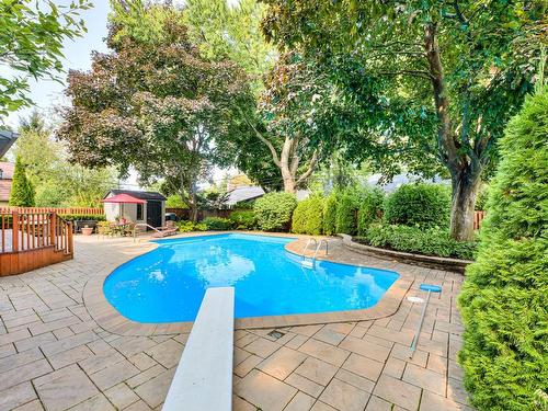 Pool - 107 Av. De Charente, Saint-Lambert, QC - Outdoor With In Ground Pool With Backyard