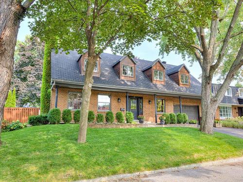 Frontage - 107 Av. De Charente, Saint-Lambert, QC - Outdoor With Deck Patio Veranda With Facade