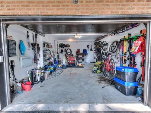 Garage - 107 Av. De Charente, Saint-Lambert, QC - Indoor Photo Showing Garage