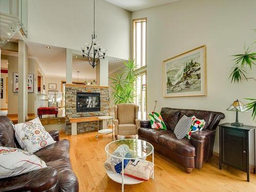 Living room - 56 Rue Du Domaine-De-La-Marquise, Saint-Sauveur, QC - Indoor Photo Showing Living Room With Fireplace