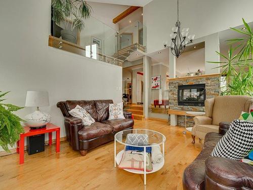 Salon - 56 Rue Du Domaine-De-La-Marquise, Saint-Sauveur, QC - Indoor Photo Showing Living Room With Fireplace