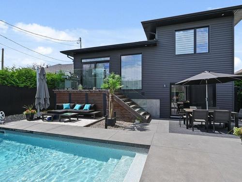 Back facade - 754 Rue Des Huards, Contrecoeur, QC - Outdoor With In Ground Pool