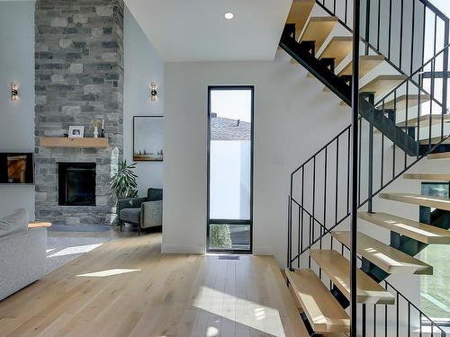 Staircase - 2048 Rue Des Cèdres, Saint-Bruno-De-Montarville, QC - Indoor With Fireplace