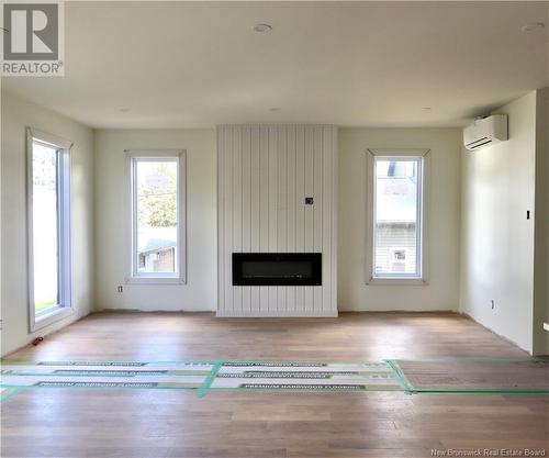 29 Chartersville, Dieppe, NB - Indoor Photo Showing Living Room With Fireplace