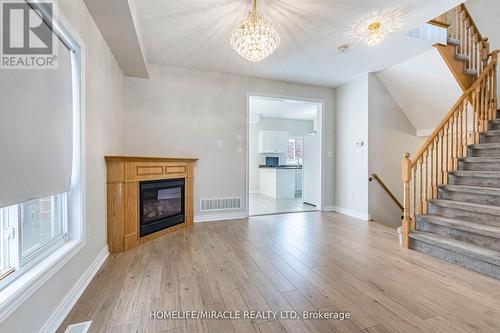 1028 Cumming Boulevard, Milton (Clarke), ON - Indoor Photo Showing Living Room With Fireplace