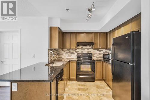 206 - 60 Baycliffe Crescent, Brampton (Northwest Brampton), ON - Indoor Photo Showing Kitchen With Double Sink