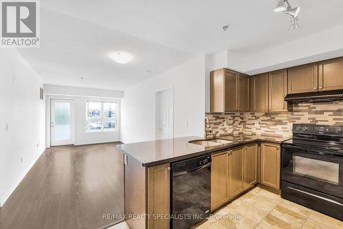 206 - 60 Baycliffe Crescent, Brampton, ON - Indoor Photo Showing Kitchen