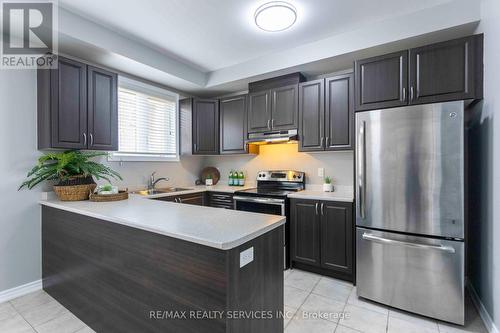 104 New Pines Trail, Brampton, ON - Indoor Photo Showing Kitchen With Stainless Steel Kitchen With Double Sink