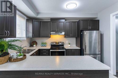 104 New Pines Trail, Brampton, ON - Indoor Photo Showing Kitchen With Stainless Steel Kitchen With Double Sink