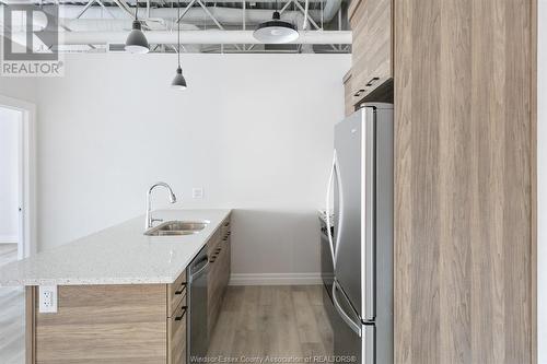 5841 Malden Square Unit# 206, Lasalle, ON - Indoor Photo Showing Kitchen With Double Sink