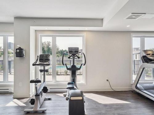 Exercise room - 409-10120 Rue Lauraine-Vaillancourt, Montréal (Ahuntsic-Cartierville), QC - Indoor Photo Showing Gym Room