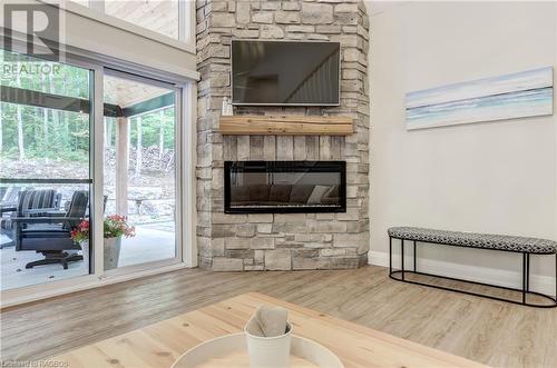 399 Mallory Beach Road, South Bruce Peninsula, ON - Indoor Photo Showing Living Room With Fireplace