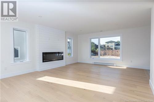 58 Renoir Street, Moncton, NB - Indoor Photo Showing Living Room With Fireplace