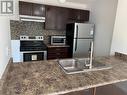 2186 Batters Loop, Innisfil, ON  - Indoor Photo Showing Kitchen With Double Sink With Upgraded Kitchen 