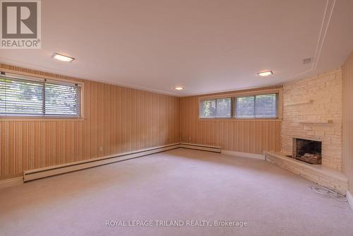 74 Wychwood Park, London, ON - Indoor Photo Showing Other Room With Fireplace