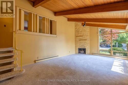 74 Wychwood Park, London, ON - Indoor Photo Showing Other Room With Fireplace