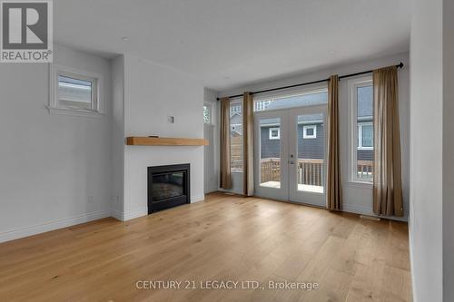 245 Mill Pond Place, Kingston, ON - Indoor Photo Showing Living Room With Fireplace