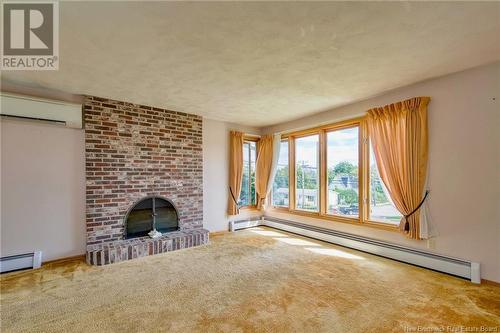 46 Charlotte Street, Sackville, NB - Indoor With Fireplace