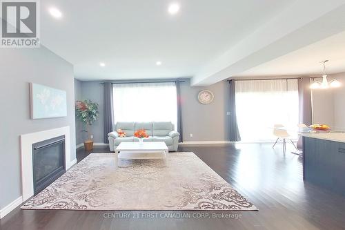 2064 Tribalwood Street, London, ON - Indoor Photo Showing Living Room With Fireplace