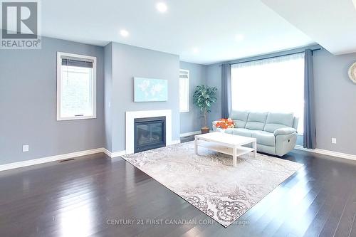 2064 Tribalwood Street, London, ON - Indoor Photo Showing Living Room With Fireplace