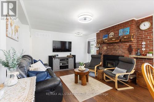 27 Lakeshore Road, Georgina, ON - Indoor Photo Showing Living Room With Fireplace