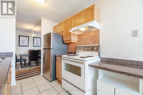 1408 - 21 Knightsbridge Road E, Brampton (Queen Street Corridor), ON - Indoor Photo Showing Kitchen