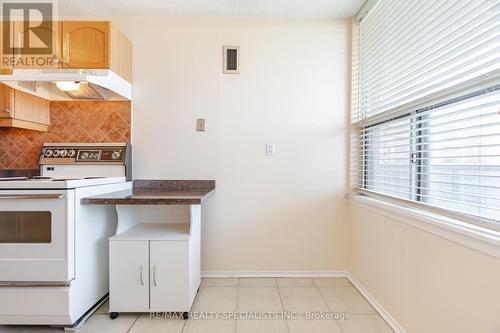 1408 - 21 Knightsbridge Road E, Brampton (Queen Street Corridor), ON - Indoor Photo Showing Kitchen