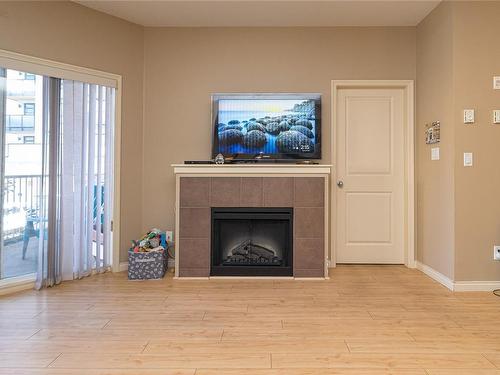 204-821 Goldstream Ave, Langford, BC - Indoor Photo Showing Living Room With Fireplace