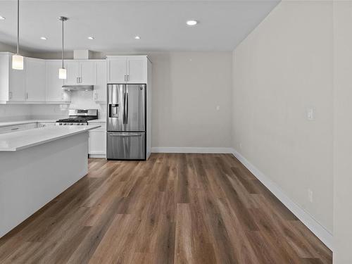 A-330 Lone Oak Pl, Langford, BC - Indoor Photo Showing Kitchen With Stainless Steel Kitchen With Upgraded Kitchen