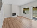 A-330 Lone Oak Pl, Langford, BC  - Indoor Photo Showing Other Room With Fireplace 