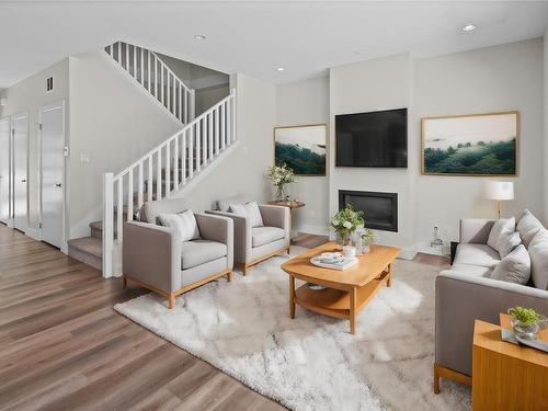 A-330 Lone Oak Pl, Langford, BC - Indoor Photo Showing Living Room With Fireplace