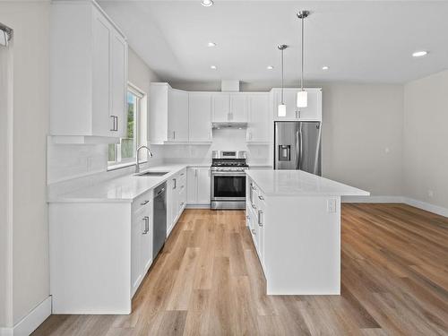 A-330 Lone Oak Pl, Langford, BC - Indoor Photo Showing Kitchen With Stainless Steel Kitchen With Upgraded Kitchen