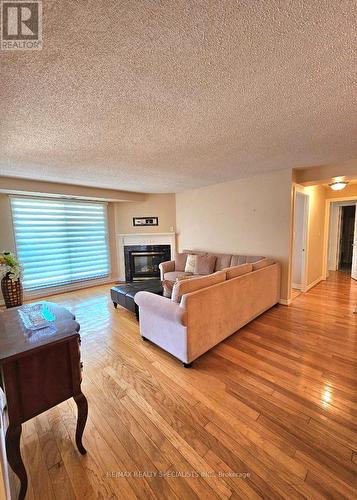 412 - 121 Woodbridge Avenue, Vaughan, ON - Indoor Photo Showing Living Room With Fireplace