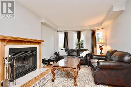 1916 Applewood Avenue, Innisfil (Alcona), ON - Indoor Photo Showing Living Room With Fireplace