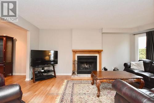 1916 Applewood Avenue, Innisfil, ON - Indoor Photo Showing Living Room With Fireplace