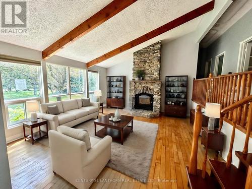 127 River Garden Road, Marmora And Lake, ON - Indoor Photo Showing Living Room With Fireplace