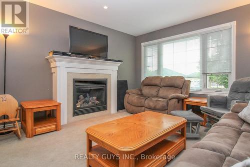 717 Overend Gardens, Peterborough (Monaghan), ON - Indoor Photo Showing Living Room With Fireplace