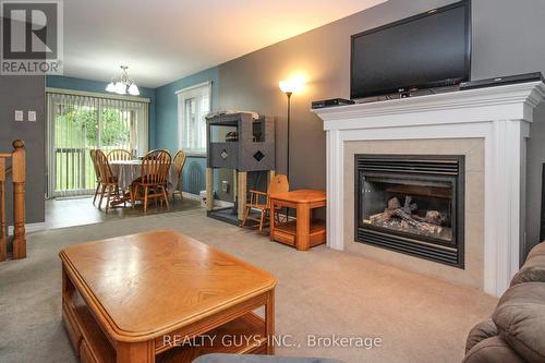 717 Overend Gardens, Peterborough (Monaghan), ON - Indoor Photo Showing Living Room With Fireplace