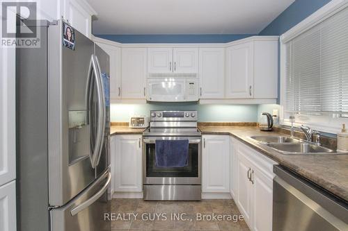 717 Overend Gardens, Peterborough (Monaghan), ON - Indoor Photo Showing Kitchen With Double Sink