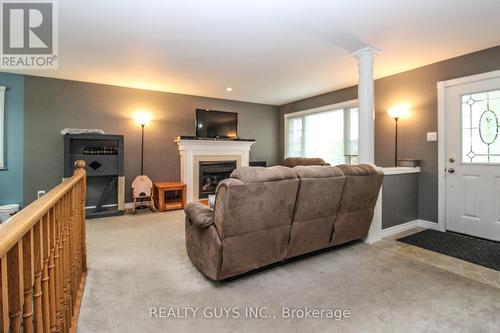 717 Overend Gardens, Peterborough (Monaghan), ON - Indoor Photo Showing Living Room With Fireplace