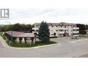 1201 Kokanee  Drive Unit# 308, Cranbrook, BC  - Outdoor With Balcony With Facade 