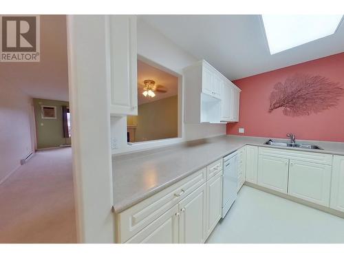 1201 Kokanee  Drive Unit# 308, Cranbrook, BC - Indoor Photo Showing Kitchen With Double Sink